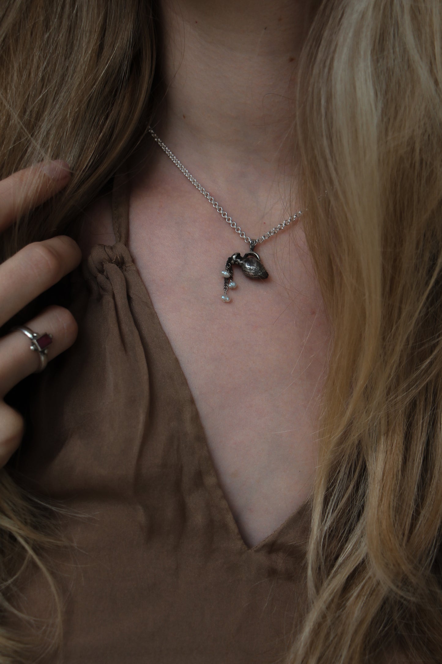 silver Aquarius necklace with fresh water pearls amphora