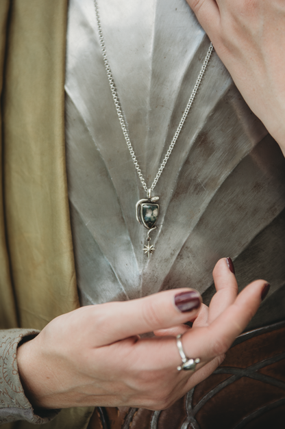 SÍRIEL II snake and star high fantasy pendant in sterling silver with moss agate shield