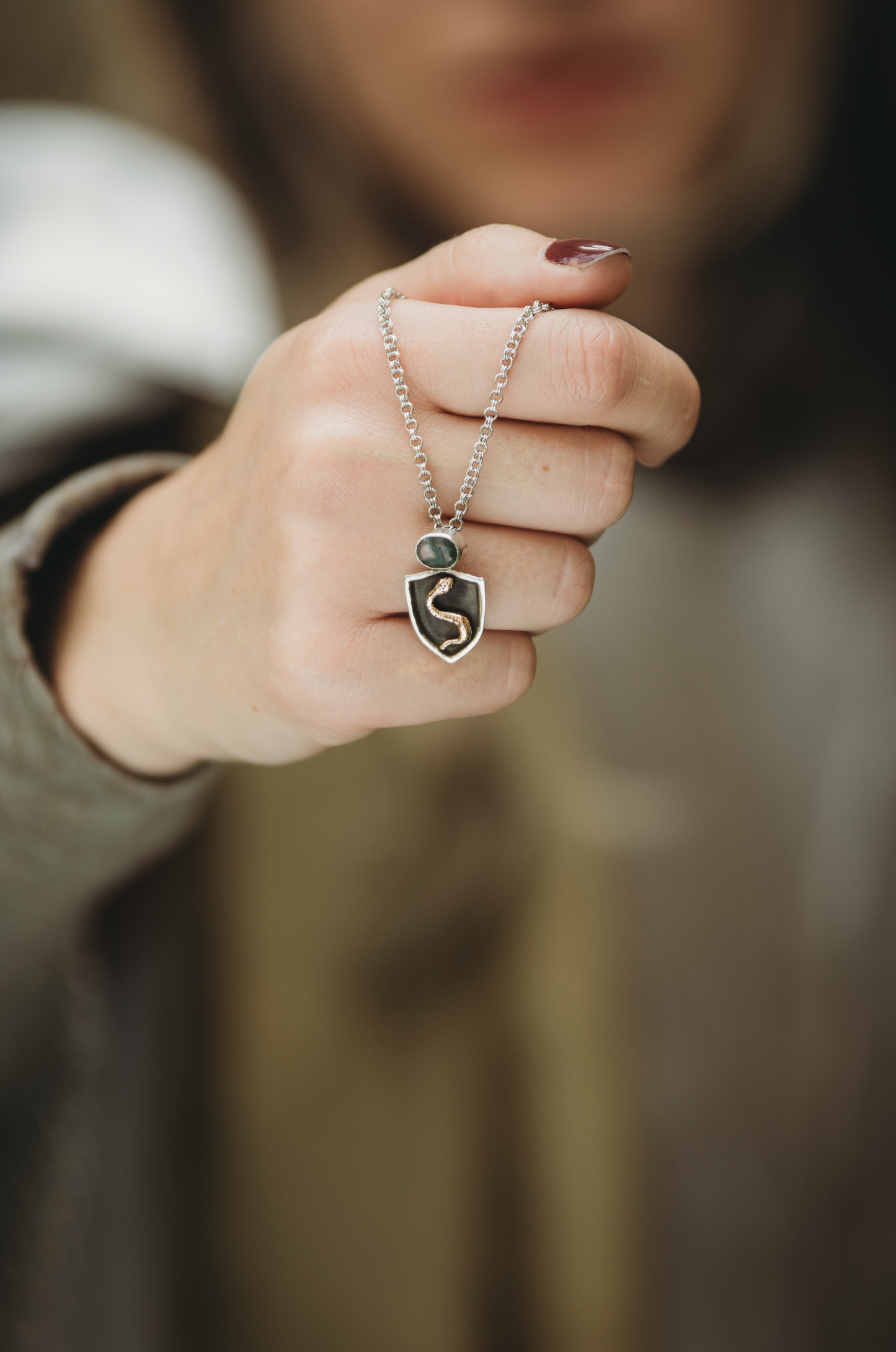 NESSAVËL snake shield high fantasy pendant in sterling silver and bronze with moss agate shield