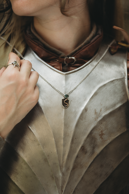 NESSAVËL snake shield high fantasy pendant in sterling silver and bronze with moss agate shield