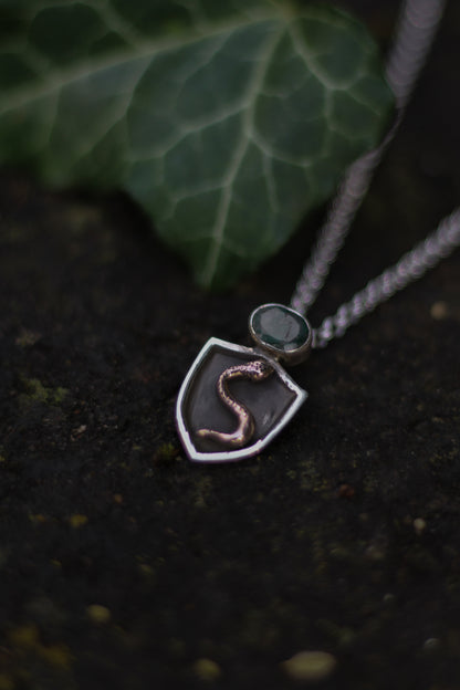 NESSAVËL snake shield high fantasy pendant in sterling silver and bronze with moss agate shield