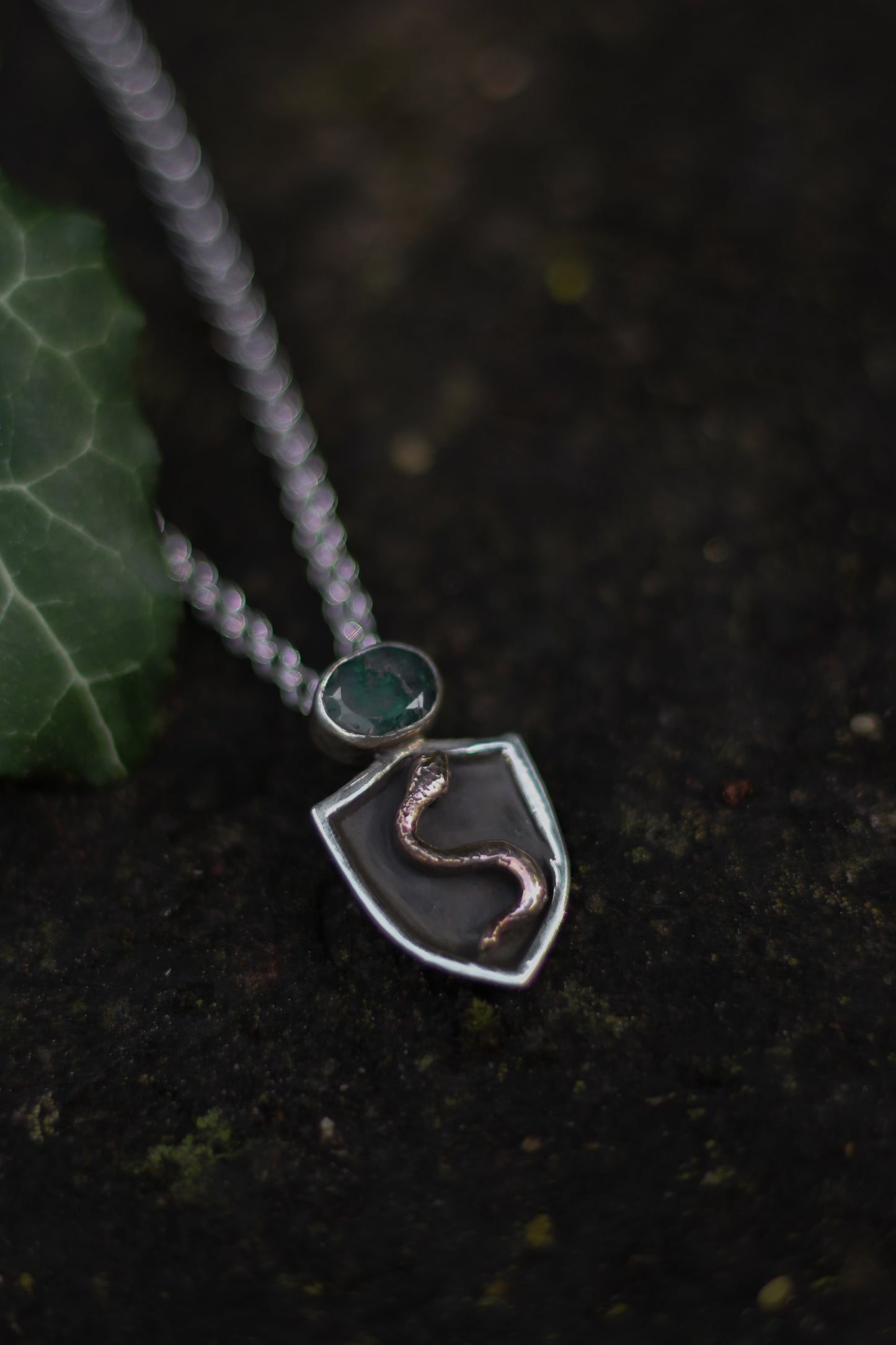 NESSAVËL snake shield high fantasy pendant in sterling silver and bronze with moss agate shield