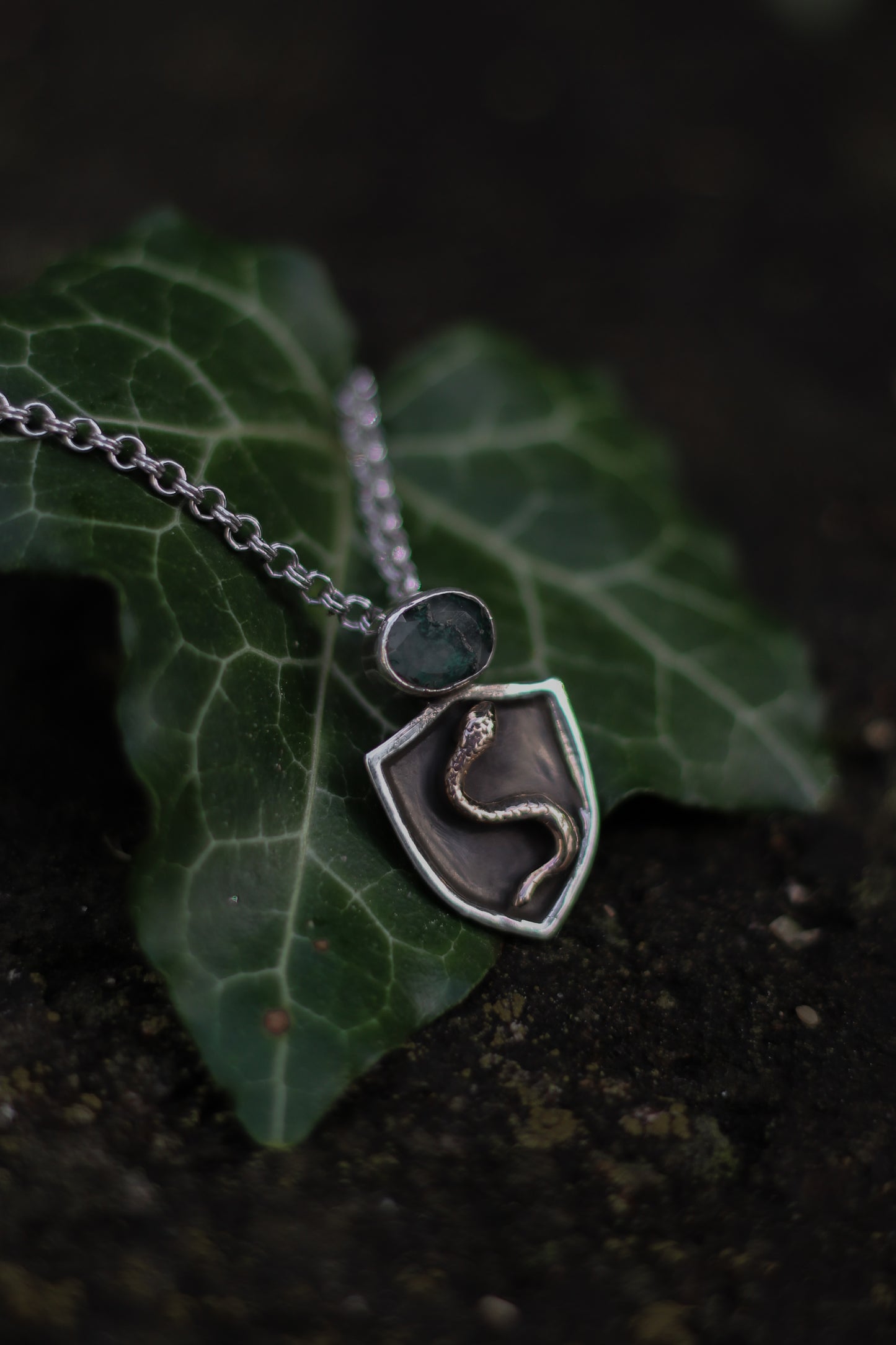 NESSAVËL snake shield high fantasy pendant in sterling silver and bronze with moss agate shield