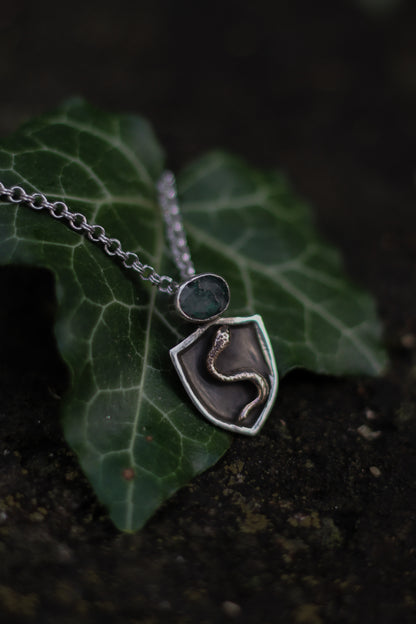 NESSAVËL snake shield high fantasy pendant in sterling silver and bronze with moss agate shield