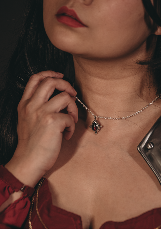 Handmade sterling silver necklace with garnet drop pendant