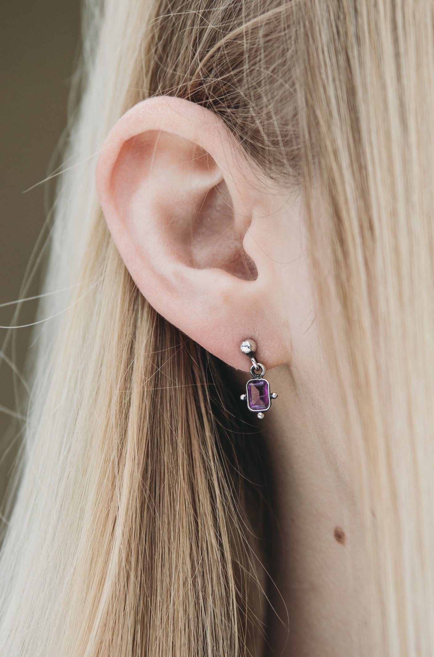 Historical medieval silver stud earrings with purple amethyst gemstones