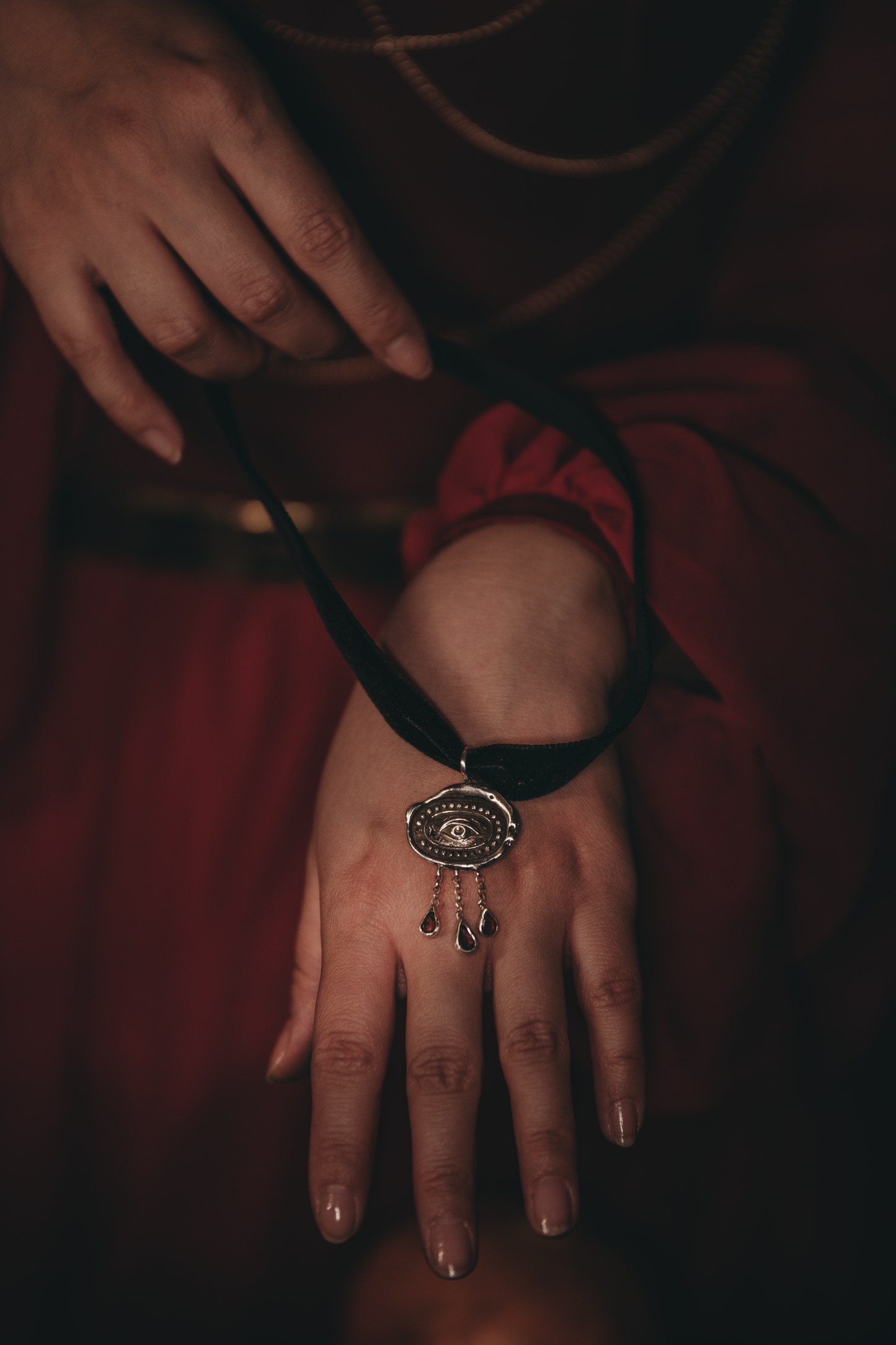 Victorian Black velvet choker with silver Lovers Eye miniature and garnet stone accents