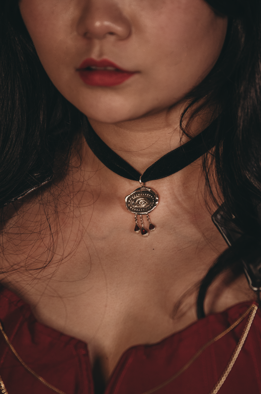 Victorian Black velvet choker with silver Lovers Eye miniature and garnet stone accents