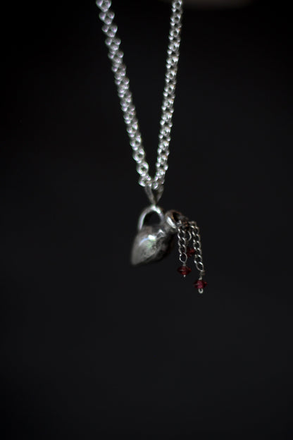 Aquarius sterling silver necklace with garnet drops