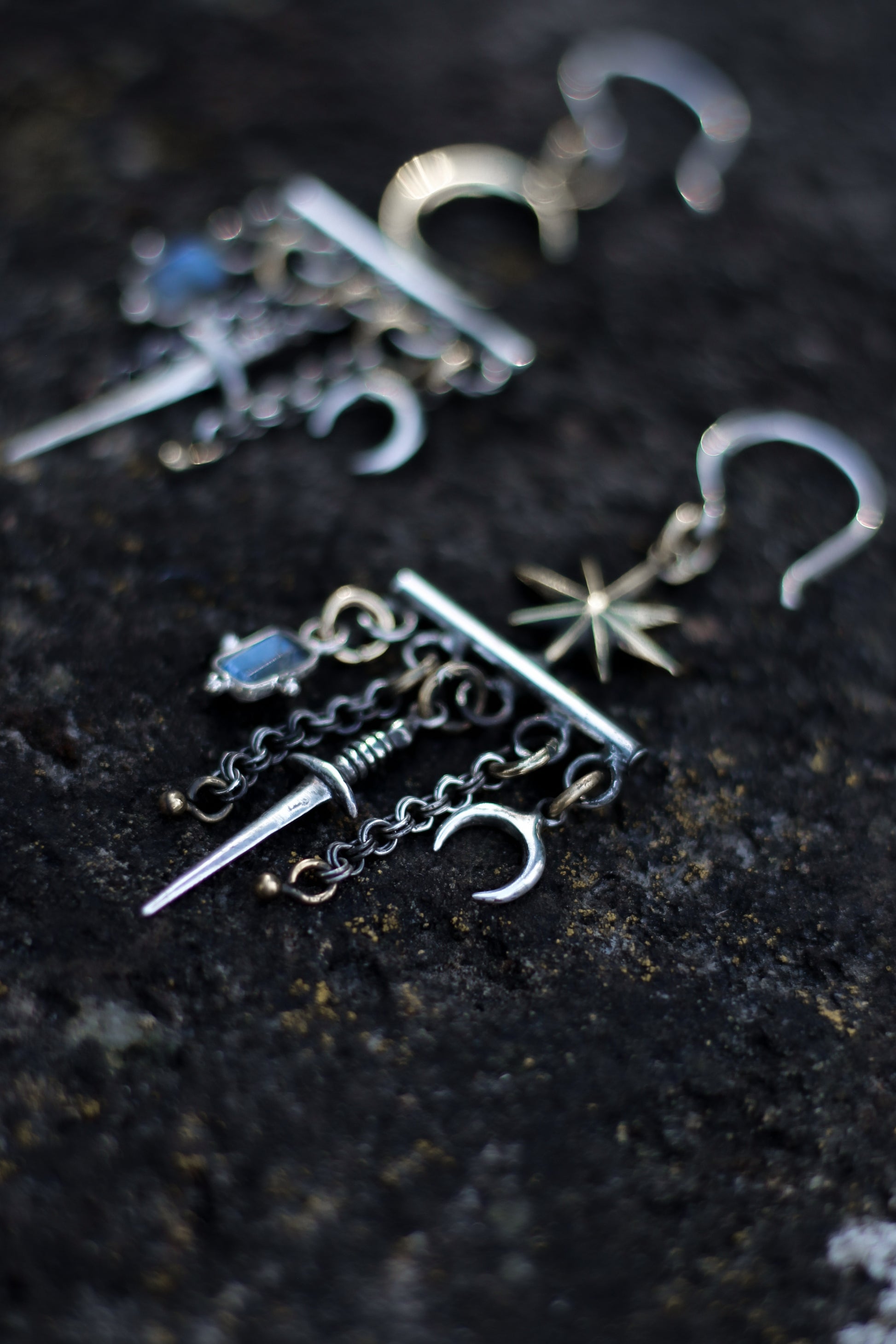 velar celestial moon and star swords earrings with sword star and moon