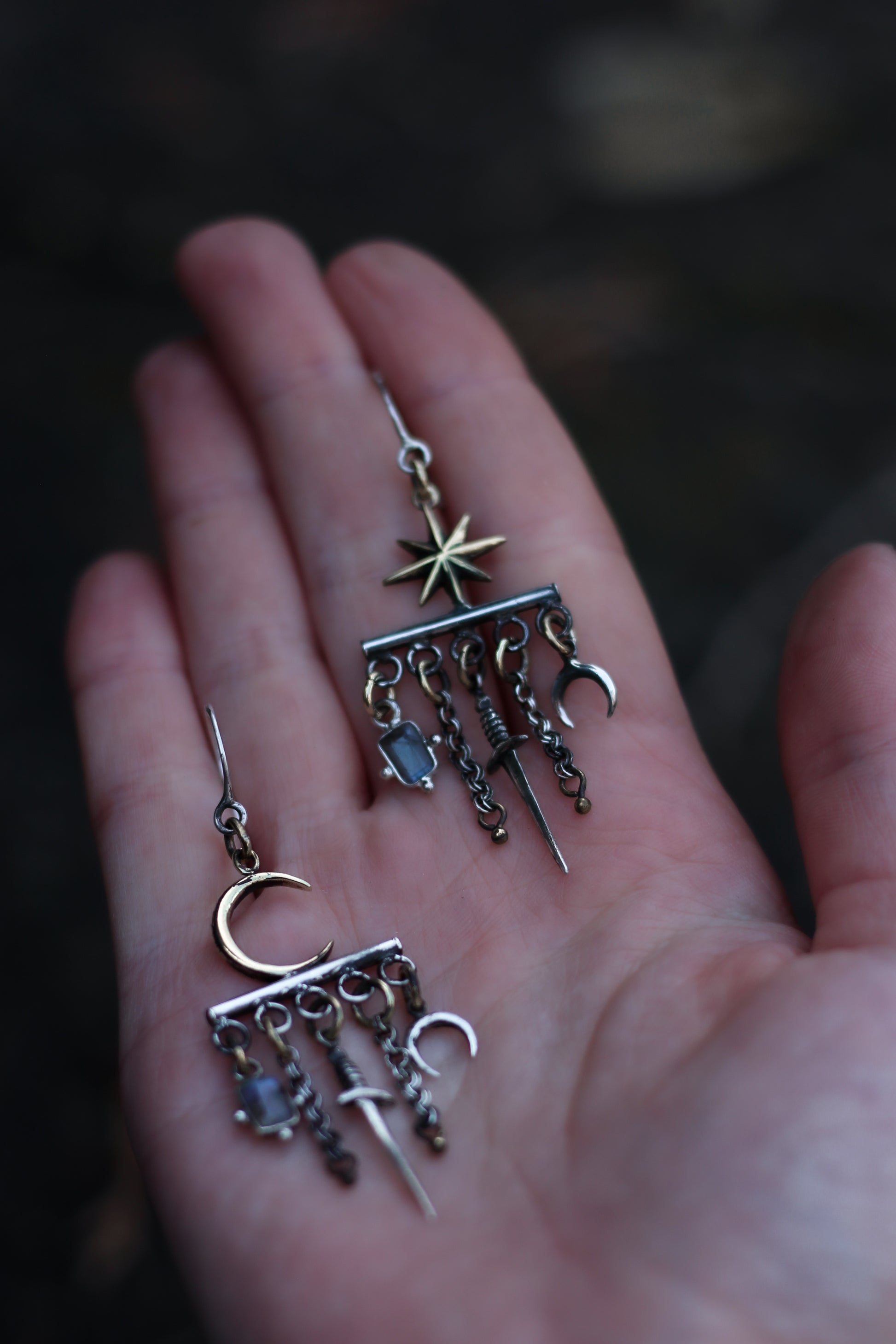 velar celestial moon and star swords earrings