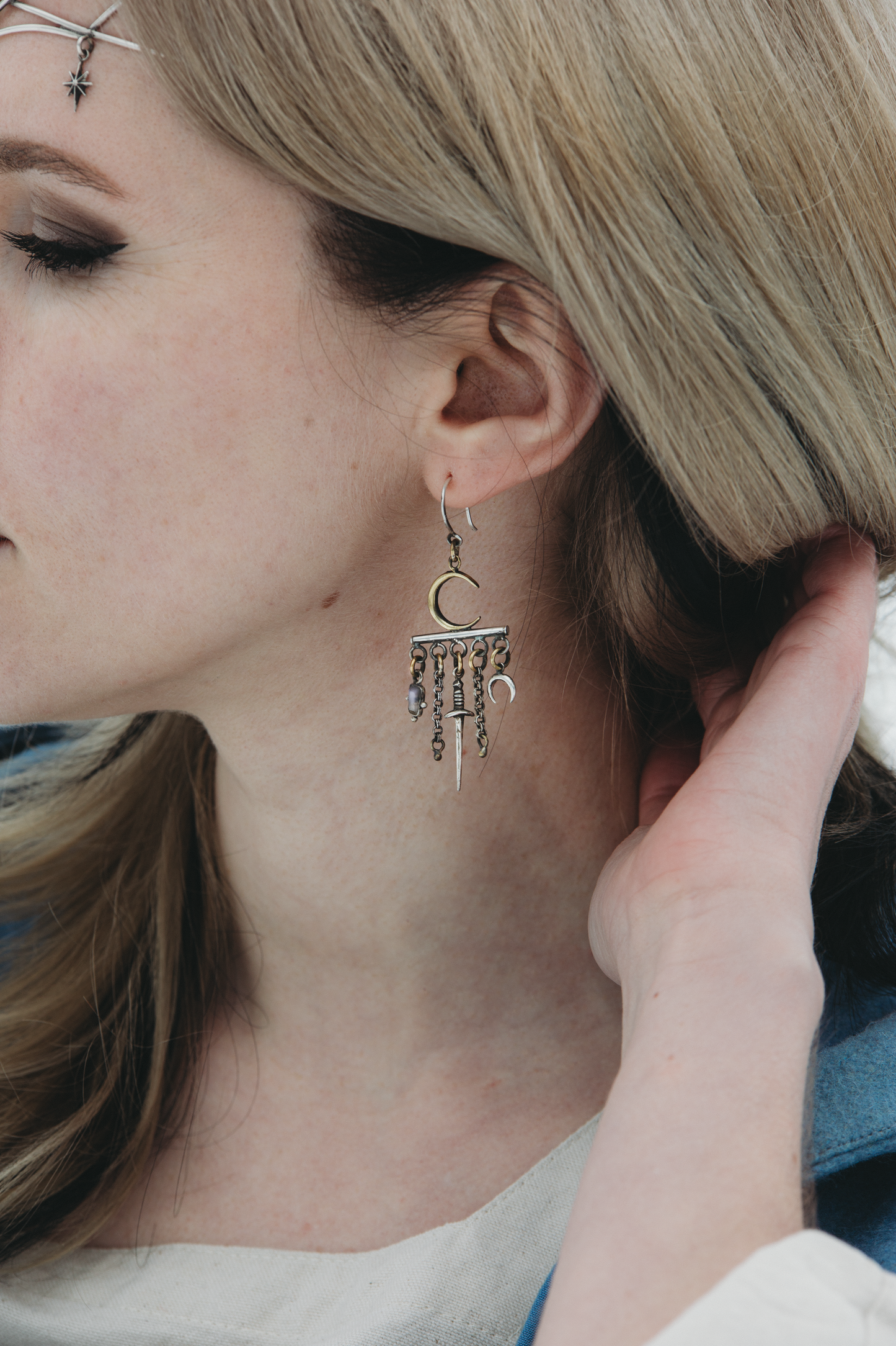 velar celestial moon and star swords earrings right ear